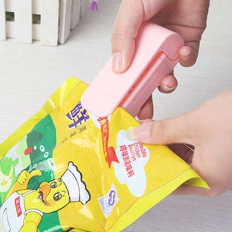 Hand Pressure Food Packaging Bag Sealing Machine Pink